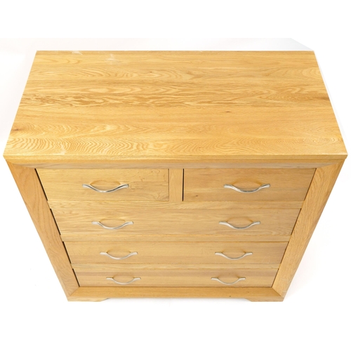 1002 - Contemporary light oak five drawer chest, 94cm H x 90cm W x 45cm D