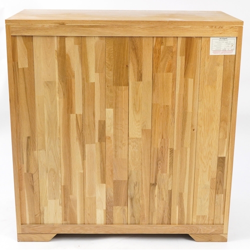 1002 - Contemporary light oak five drawer chest, 94cm H x 90cm W x 45cm D