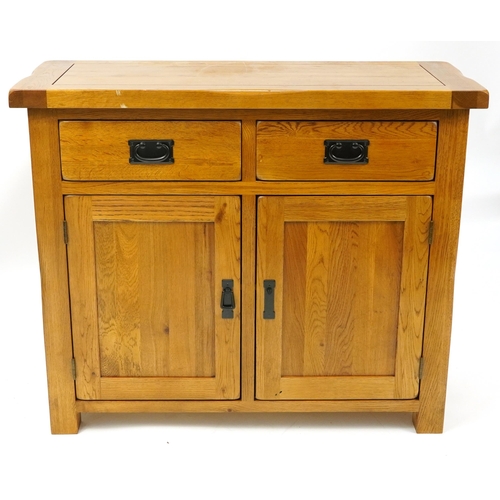 1009 - Light oak side cabinet with two drawers above a pair of cupboard doors, 83cm H x 100cm W x 42cm D