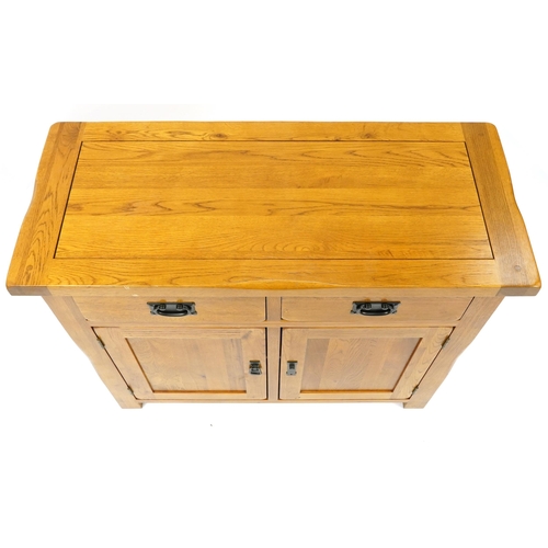 1009 - Light oak side cabinet with two drawers above a pair of cupboard doors, 83cm H x 100cm W x 42cm D