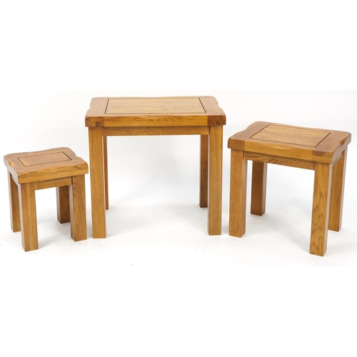 1010 - Nest of three light oak occasional tables, the largest 49cm H x 52cm W x 36cm D