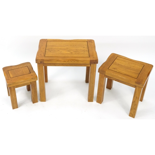 1010 - Nest of three light oak occasional tables, the largest 49cm H x 52cm W x 36cm D