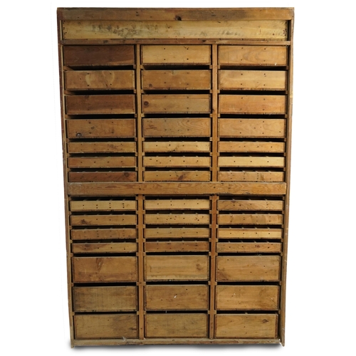 1017 - Large hardwood haberdashery cabinet fitted with forty six drawers, each with divisional interior, 19... 