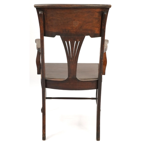 1024 - Jas Shoolbred and Co, mahogany armchair with H stretcher, 100cm high