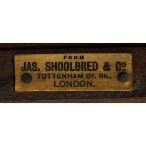 1024 - Jas Shoolbred and Co, mahogany armchair with H stretcher, 100cm high