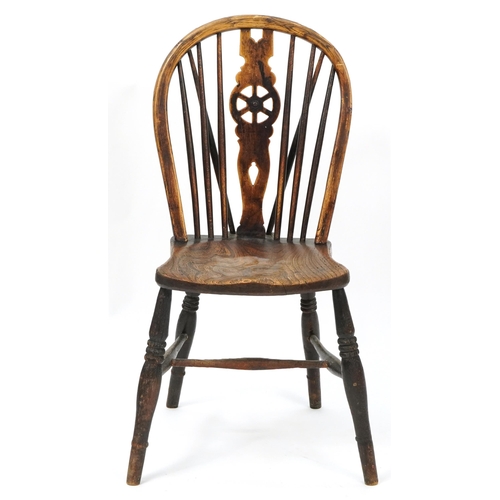 1032 - Antique ash and elm wheelback chair impressed J M to the back, 90cm high