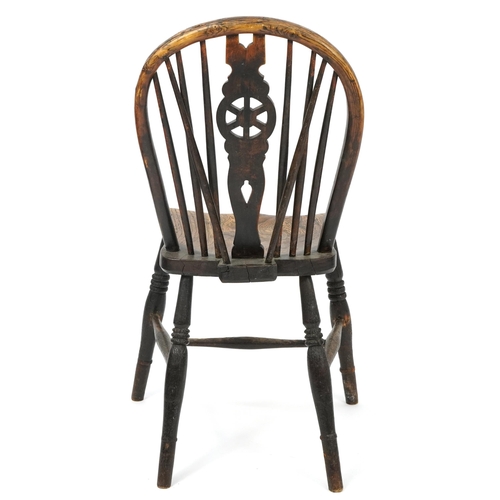 1032 - Antique ash and elm wheelback chair impressed J M to the back, 90cm high