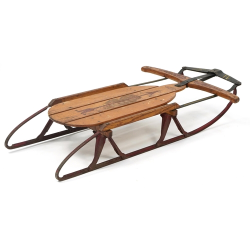 1036 - Vintage Flexible Flyer wooden and metal sled, 100cm in length