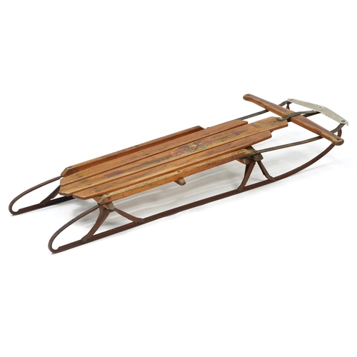 1037 - Vintage Flexible Flyer Super Steering wooden and metal sled, 131cm in length