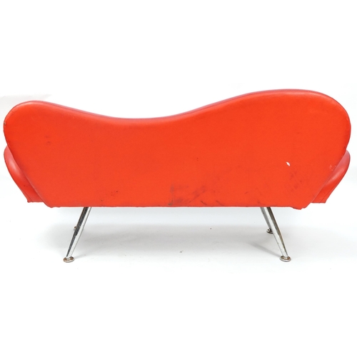 1049 - Red leather lips design salon settee raised on chrome legs, 180cm wide