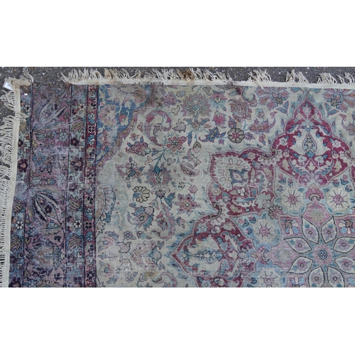 1075 - Rectangular Persian Heriz type rug having an allover floral design, 300cm x 170cm