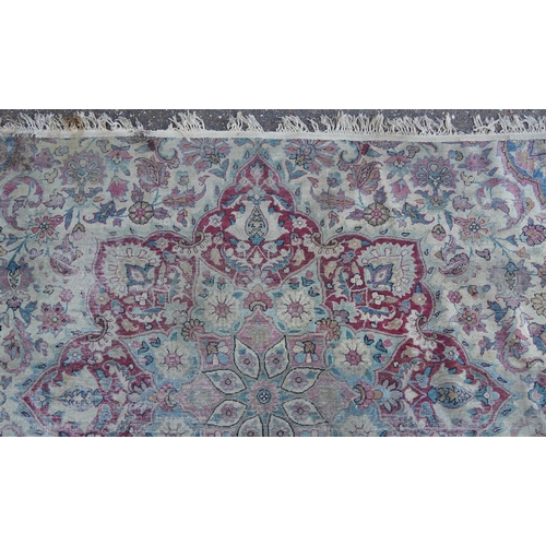 1075 - Rectangular Persian Heriz type rug having an allover floral design, 300cm x 170cm