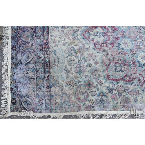 1075 - Rectangular Persian Heriz type rug having an allover floral design, 300cm x 170cm