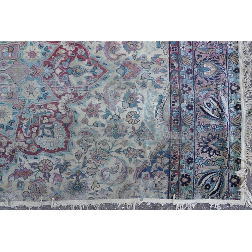 1075 - Rectangular Persian Heriz type rug having an allover floral design, 300cm x 170cm