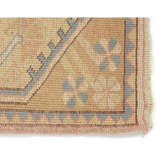 1086 - Rectangular Turkish rug having an allover floral design, 195cm x 80cm