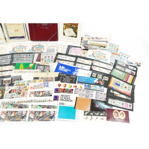 596 - Predominantly British mint unused stamps including booklets and Royal Mint presentation packs, predo... 