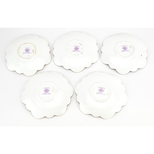 90 - Foley Wileman, five Victorian aesthetic saucers decorated with flowers, each 14cm in diameter