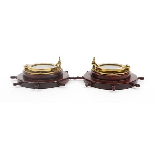 362 - Pair of Ships wheel design mahogany and brass port hole photo frames, each 31cm in diameter