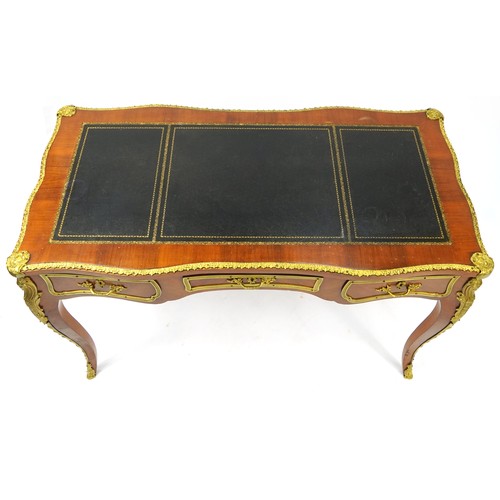 1083 - French Empire style Bureau Plat with gilt metal mounts, tooled leather insert and three drawers, 76c... 