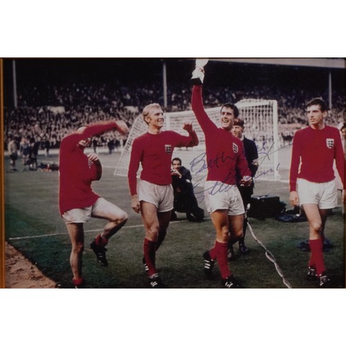 603 - Footballing interest Sir Geoff Hurst display with signed jersey and facsimile World Championship 196... 