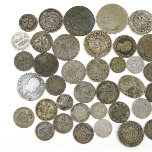 552 - Antique and later world coinage, some silver including German one mark and half mark, 139g