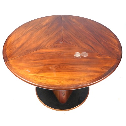 1043 - Skovby Mobelfabrik, Danish mid century circular rosewood extending dining table, with three folding ... 