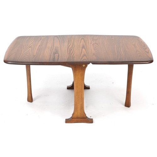 1012A - Ercol elm drop leaf coffee table, 45.5cm H x 68.5cm D x 17cm W extending to 104cm W