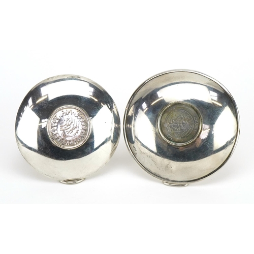 2709 - Two Egyptian circular silver King Farouk coin dishes, the largest 9.5cm in diameter, total 98.8g