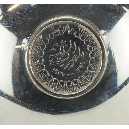 2709 - Two Egyptian circular silver King Farouk coin dishes, the largest 9.5cm in diameter, total 98.8g