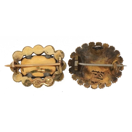 2056A - Two Victorian yellow metal brooches including a coral example with hairwork panel, the largest 2.6cm... 