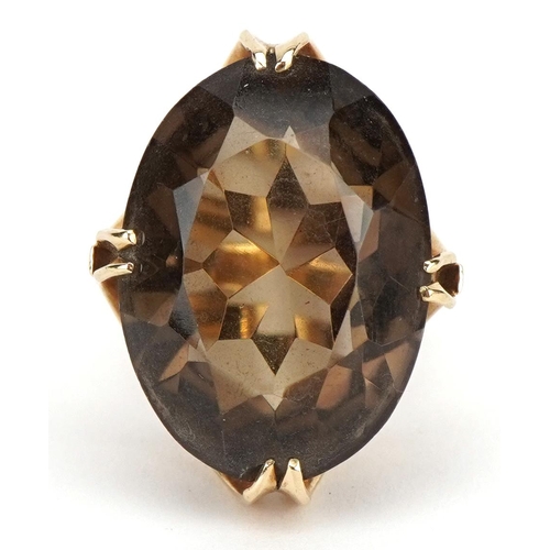 2067 - Large 9ct gold smoky quartz ring, the smoky quartz approximately 24mm x 18.0mm, size N, 10.0g