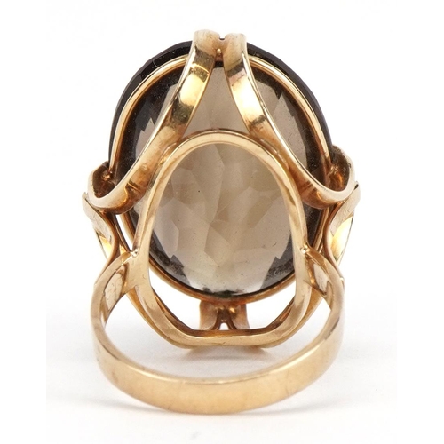 2067 - Large 9ct gold smoky quartz ring, the smoky quartz approximately 24mm x 18.0mm, size N, 10.0g