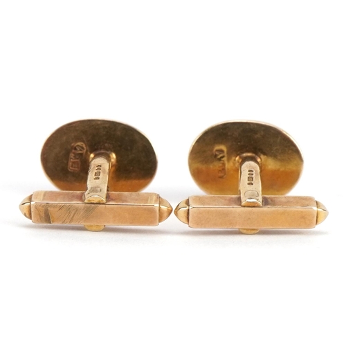 2088 - Pair of 9ct gold cabochon purple stone cufflinks housed in a Harrods box, each 1.6cm wide, 7.4g