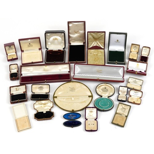 2656 - Antique and later jewellery boxes, mostly tooled leather including, Garrard, Liberty, Tiffany and Fi... 