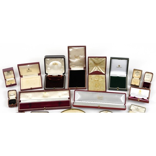 2656 - Antique and later jewellery boxes, mostly tooled leather including, Garrard, Liberty, Tiffany and Fi... 