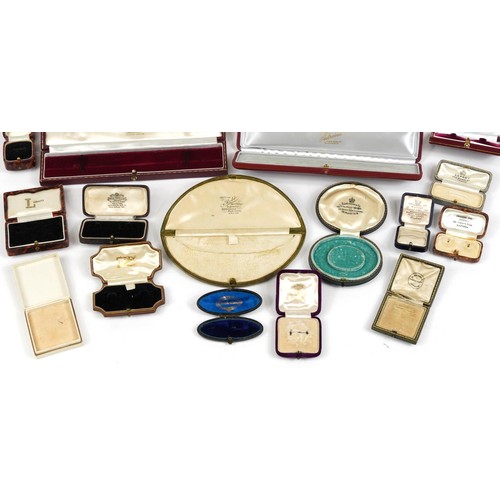 2656 - Antique and later jewellery boxes, mostly tooled leather including, Garrard, Liberty, Tiffany and Fi... 