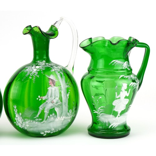 1122 - Mary Gregory glassware including a pair of jugs enamelled with a couple, the largest each 21.5cm hig... 