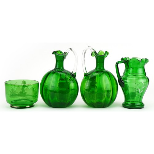 1122 - Mary Gregory glassware including a pair of jugs enamelled with a couple, the largest each 21.5cm hig... 