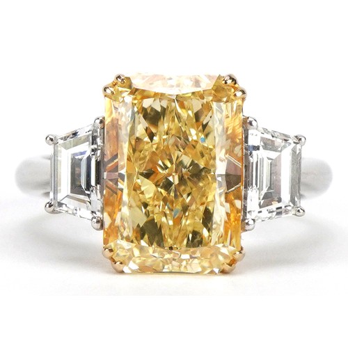 2008 - **WITHDRAWN** 18ct white gold and platinum Yellow diamond three stone ring, set with a natural fancy... 