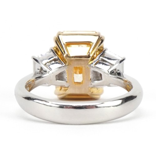 2008 - **WITHDRAWN** 18ct white gold and platinum Yellow diamond three stone ring, set with a natural fancy... 