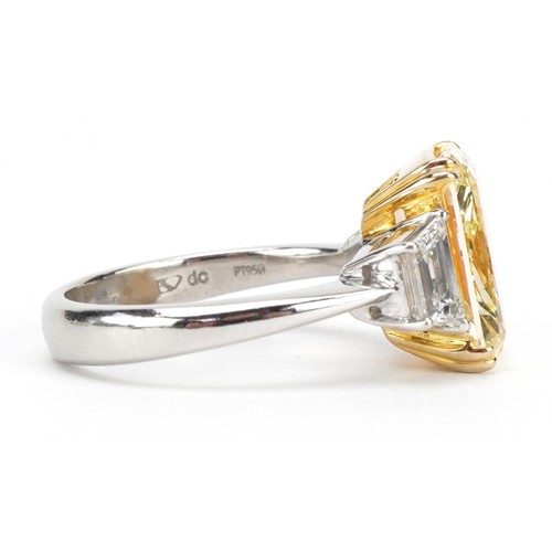 2008 - **WITHDRAWN** 18ct white gold and platinum Yellow diamond three stone ring, set with a natural fancy... 