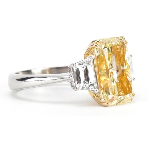 2008 - **WITHDRAWN** 18ct white gold and platinum Yellow diamond three stone ring, set with a natural fancy... 