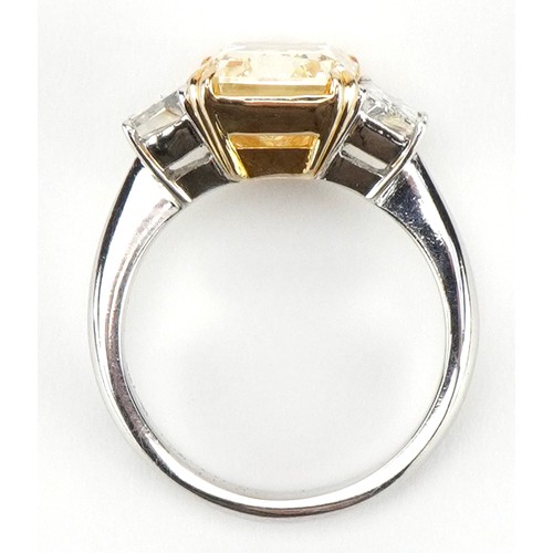 2008 - **WITHDRAWN** 18ct white gold and platinum Yellow diamond three stone ring, set with a natural fancy... 