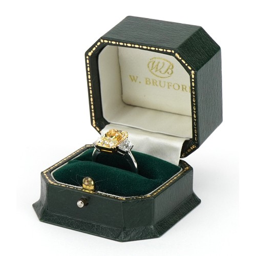 2008 - **WITHDRAWN** 18ct white gold and platinum Yellow diamond three stone ring, set with a natural fancy... 