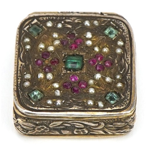 2684 - Continental 800 grade silver pillbox inset with rubies, emeralds, rubies and seed pearls, 2.1cm wide... 