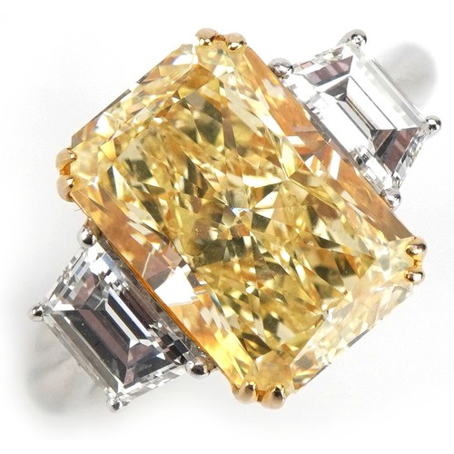 2008 - **WITHDRAWN** 18ct white gold and platinum Yellow diamond three stone ring, set with a natural fancy... 