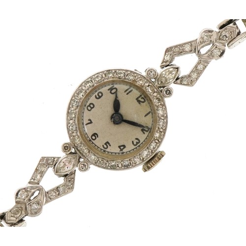 2048 - Art Deco ladies platinum and diamond cocktail watch, the 14ct white gold strap set with twenty eight... 