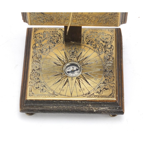 274 - Antique oak backed brass sundial and compass, 15.5cm high