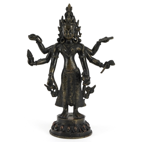 197 - Chino Tibetan patinated bronze figure of standing Buddha, 21cm high