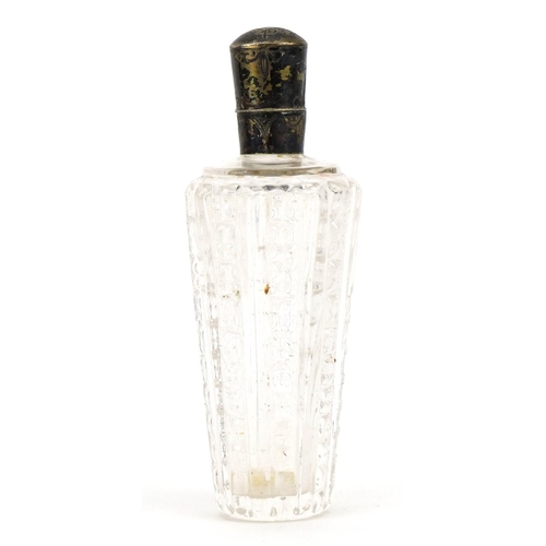 56 - Antique cut glass scent bottle with unmarked silver lid, 9cm high